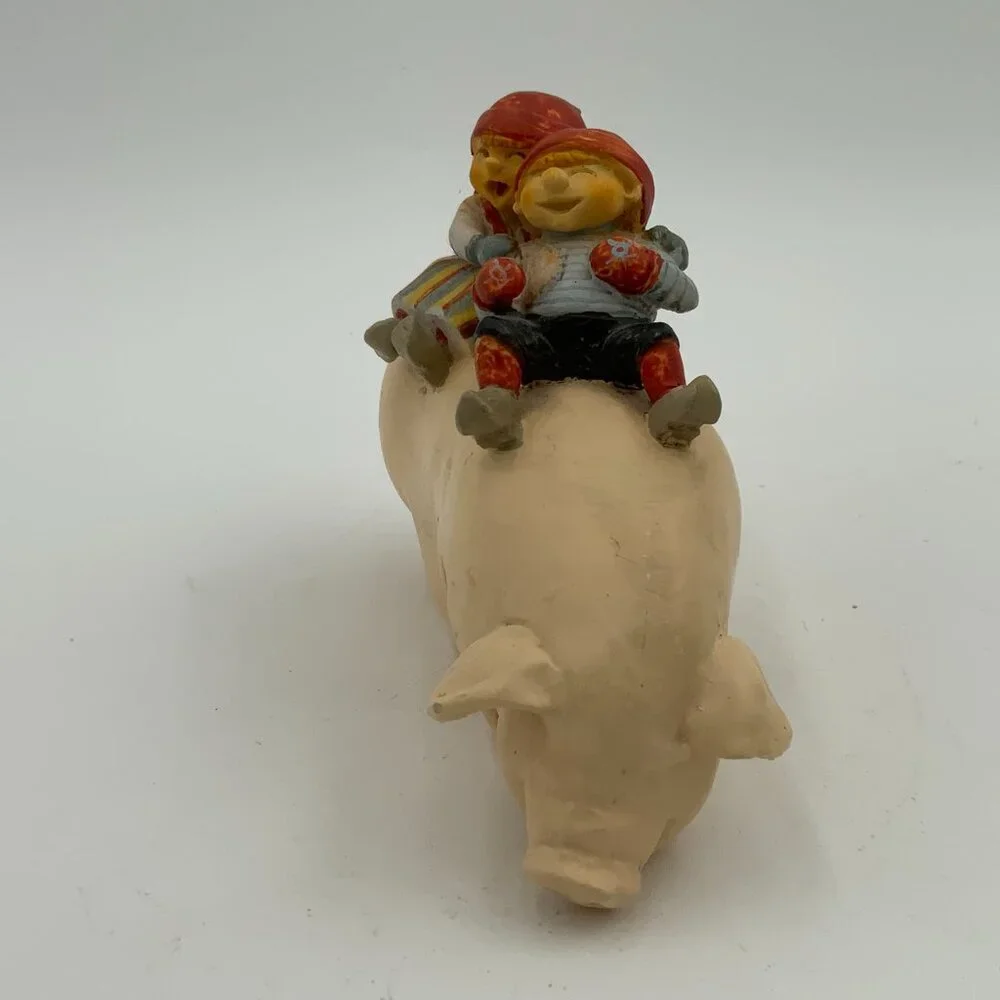 Candy Design Norway - Scandinavian Tomte Nisse Boy & Girl Riding Pig Figurine